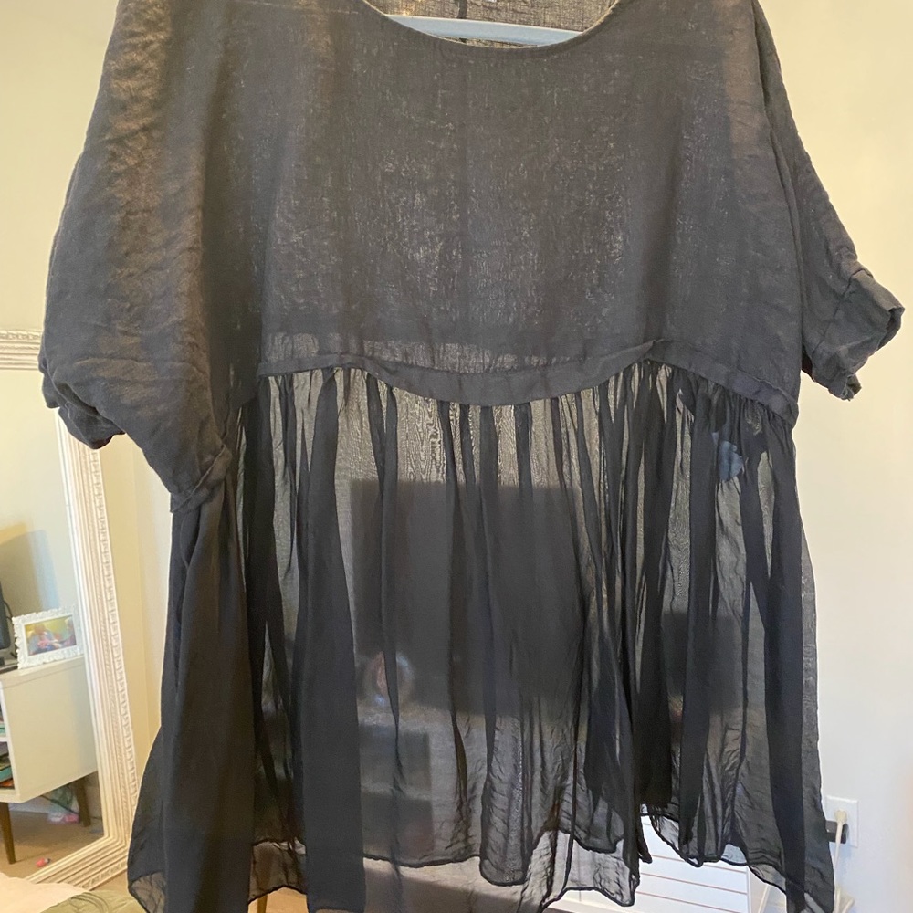 Size medium black blouse. Sheer on the bottom, linen on top